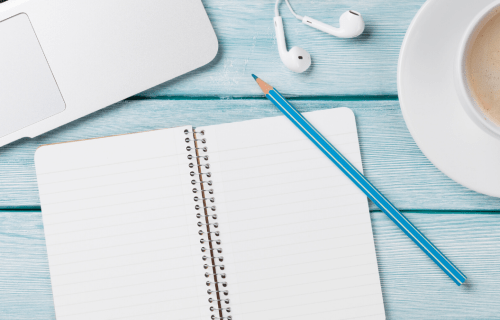 Blank notebook on desk waiting to be filled with ideas